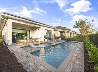 15883 Key Biscayne Lane — private pool with sun shelf and covered patio