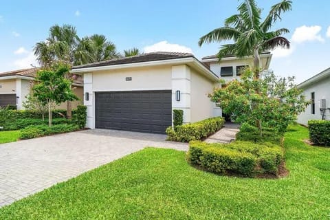 15883 Key Biscayne Lane — alternate front elevation showing house number 15883
