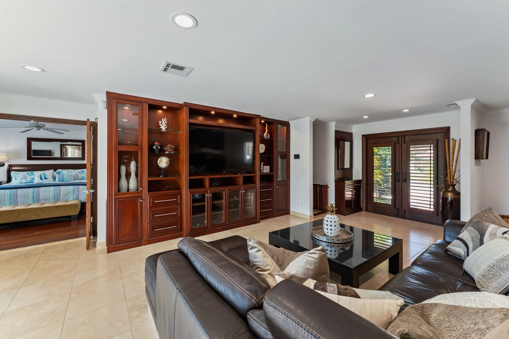 Living room — custom mahogany built-in entertainment wall