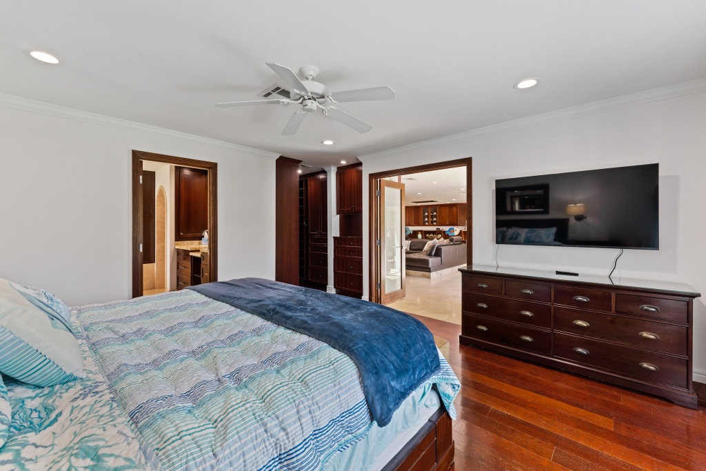 Primary suite — open plan view to walk-in closet and primary bath