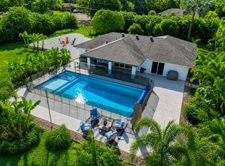 17375 Thunder Road — aerial view of pool, sun shelf, and rear patio