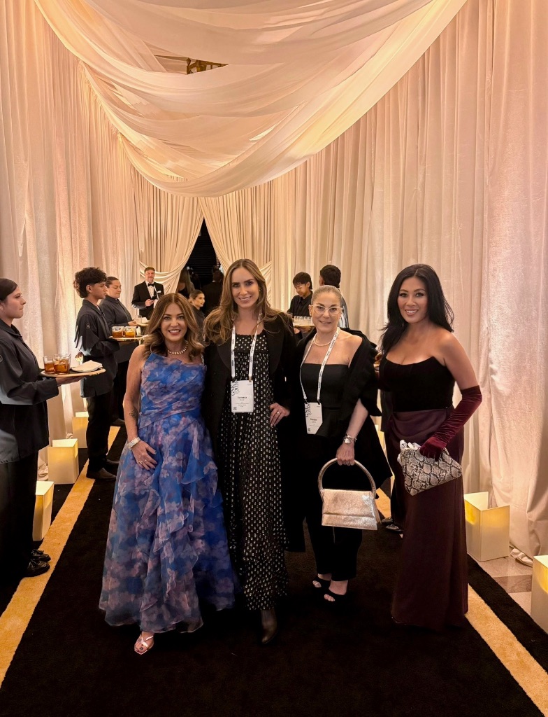Four elegantly dressed Sotheby's International Realty advisors in evening wear at the San Francisco 2026 global networking gala